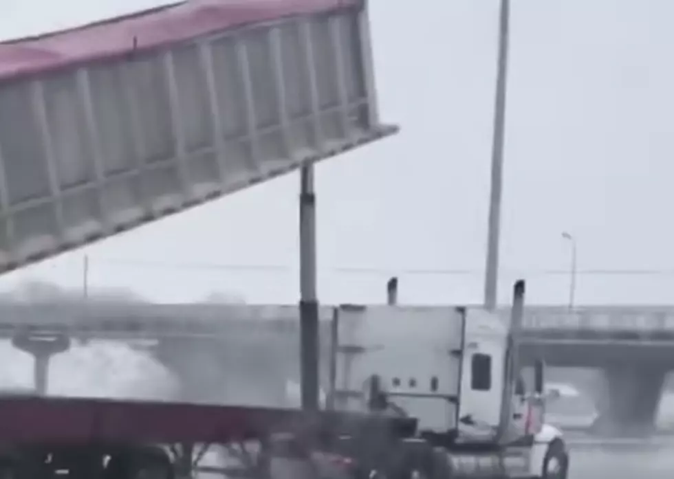 Raised Truck Bed Slams Into Overpass [VIDEO]