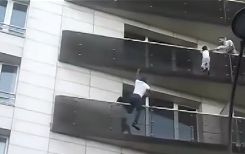 Man Scales Building In Paris To Save Child Dangling From Balcony [VIDEO]