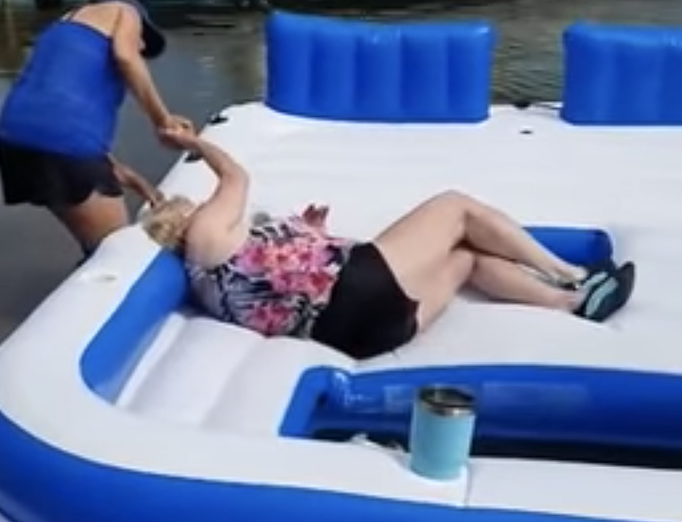 Women Struggle To Get Off Inflatable Raft [VIDEO]