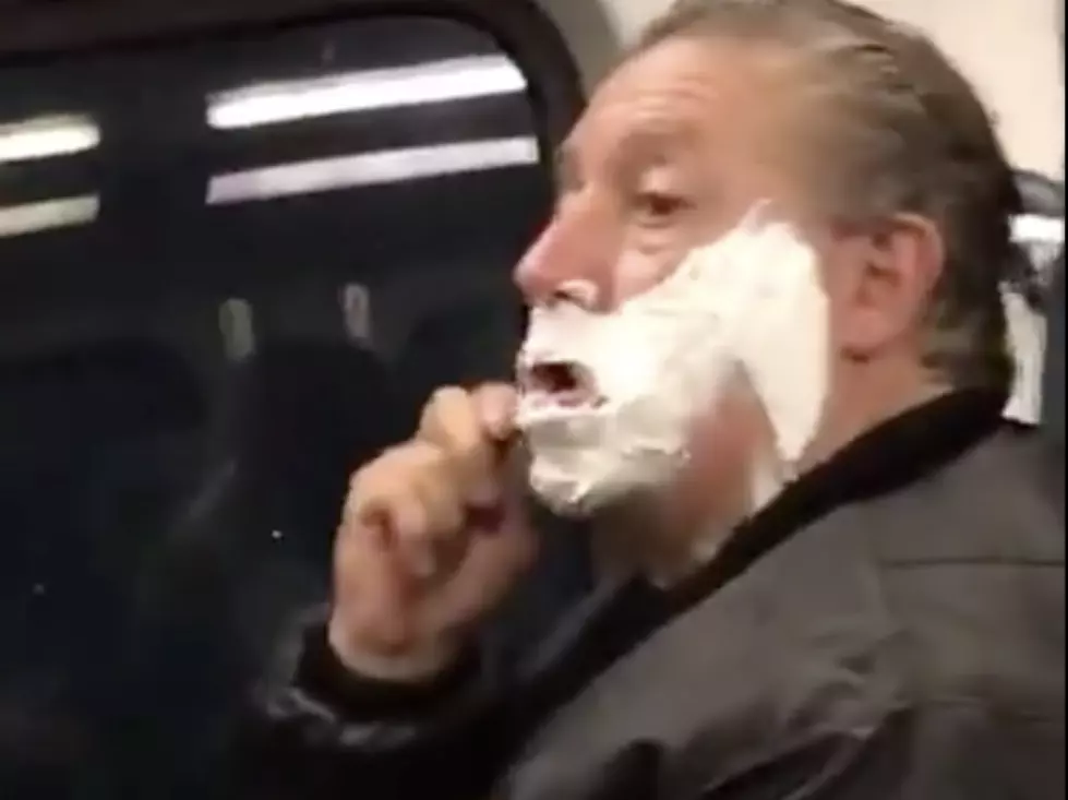 Man Shaves While On Train [VIDEO]