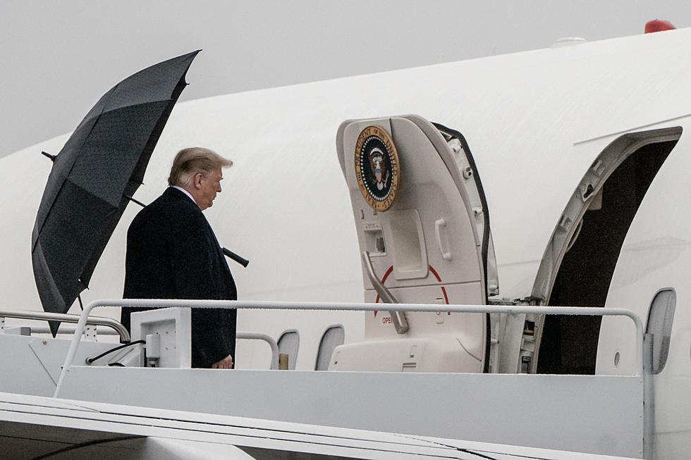 President Trump Abandons Umbrella Before Entering Air Force One [VIDEO]
