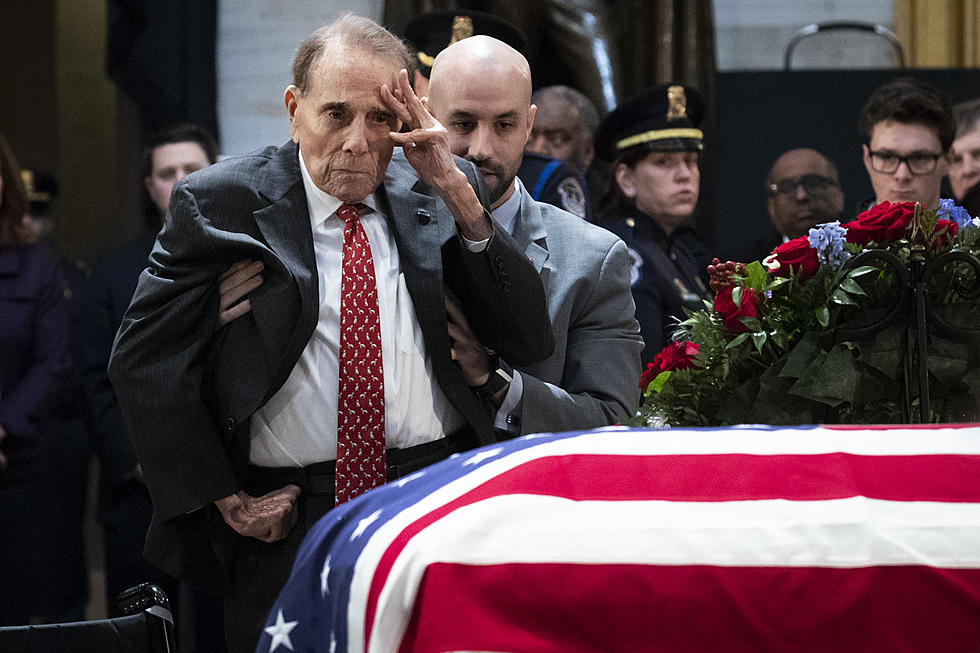 Former Senator Bob Dole Gets Out Of Wheel Chair To Salute George H.W. Bush [VIDEO]