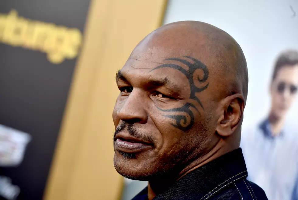 Mike Tyson Throwing Darts Blindfolded [Video]