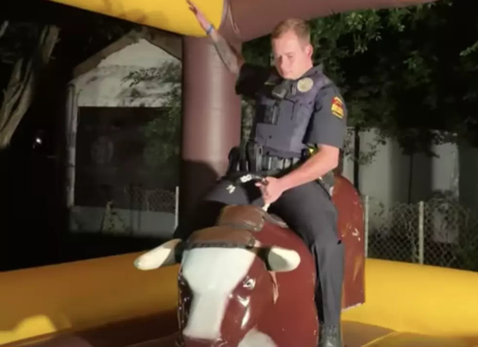 Police Officer Rides Mechanical Bull After Being Called Out To Residence [VIDEO]