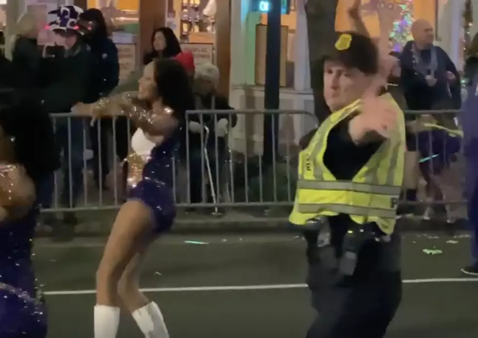 This Dancing Police Officer Is Totally Feeling The Mardi Gras Spirit