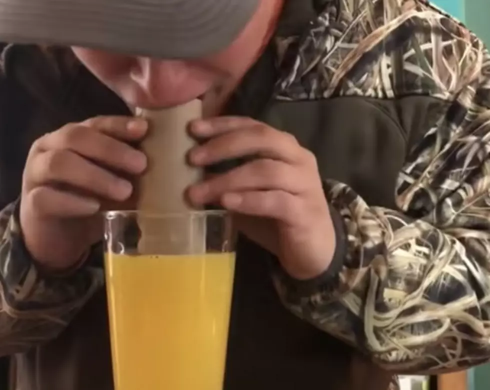 Guy Attempts To Drink Orange Juice From Toilet Paper Roll [VIDEO]