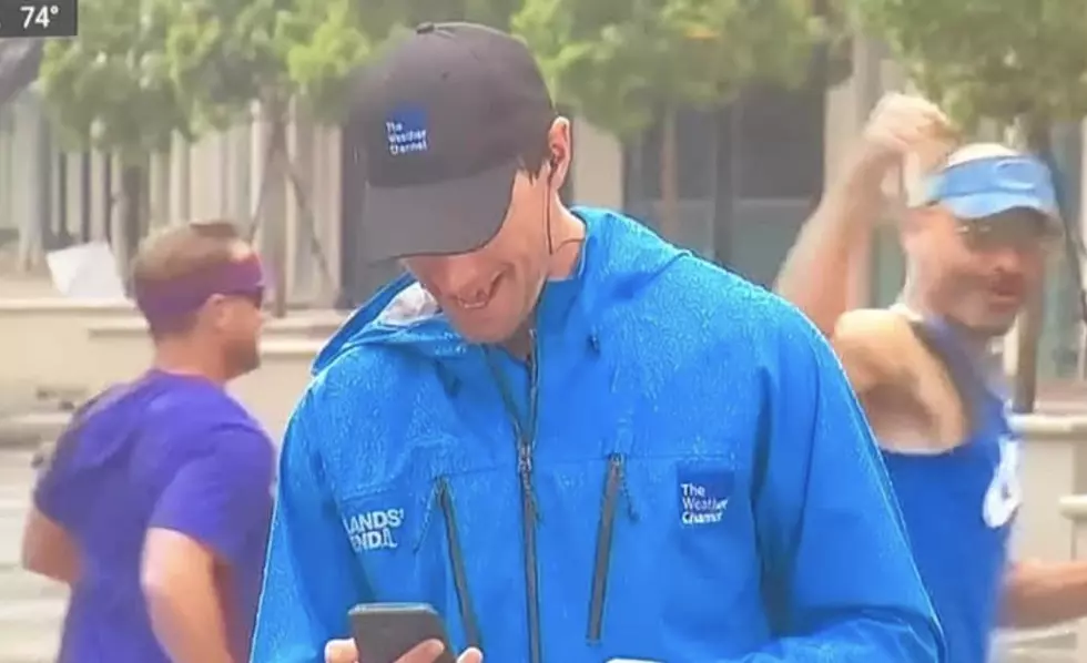 Two Men in Lafayette Jog Past Weather Channel Reporter [VIDEO]