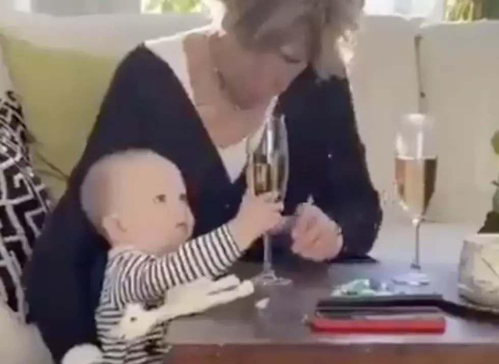 Grandma Saves Glass of Champagne, Lets Toddler Fall to Floor [VIDEO]