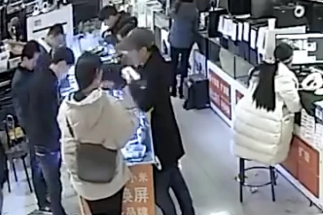 Man Bites Into Phone Phone Battery and It Immediately Explodes [VIDEO]