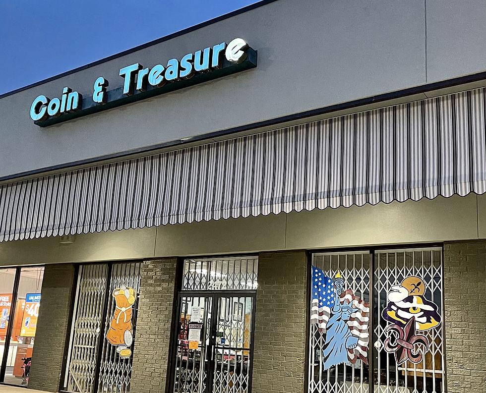 Coin and Treasure Owner Defends Himself, Anti-Chinese Communist Sign