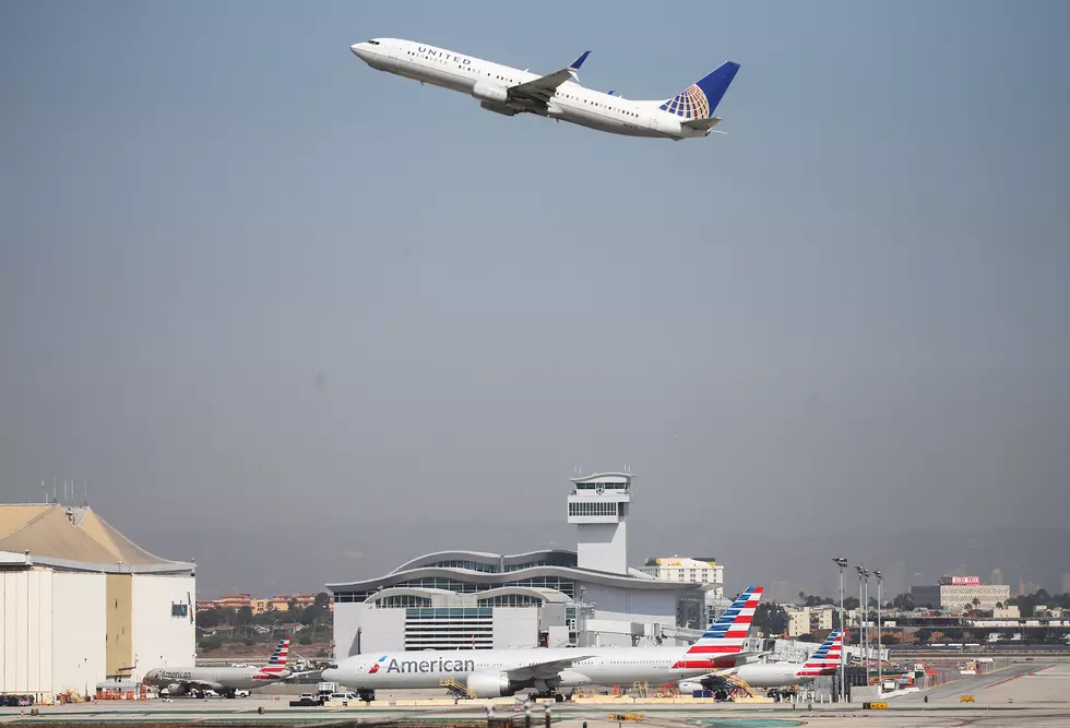 Man Survives 11-hour Flight in Wheel Well of Plane