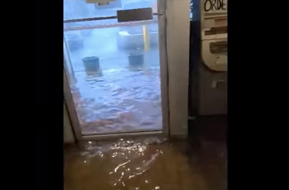 Diners Casually Continue Eating While Sitting in Water as Local Restaurant Floods in Lake Charles