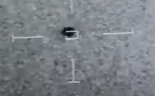 U.S. Navy Spots UFO as It Hovers and Dips Into Ocean [VIDEO]