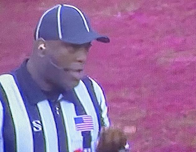 College Football Referee Seen Eating Skittles During Game [VIDEO]