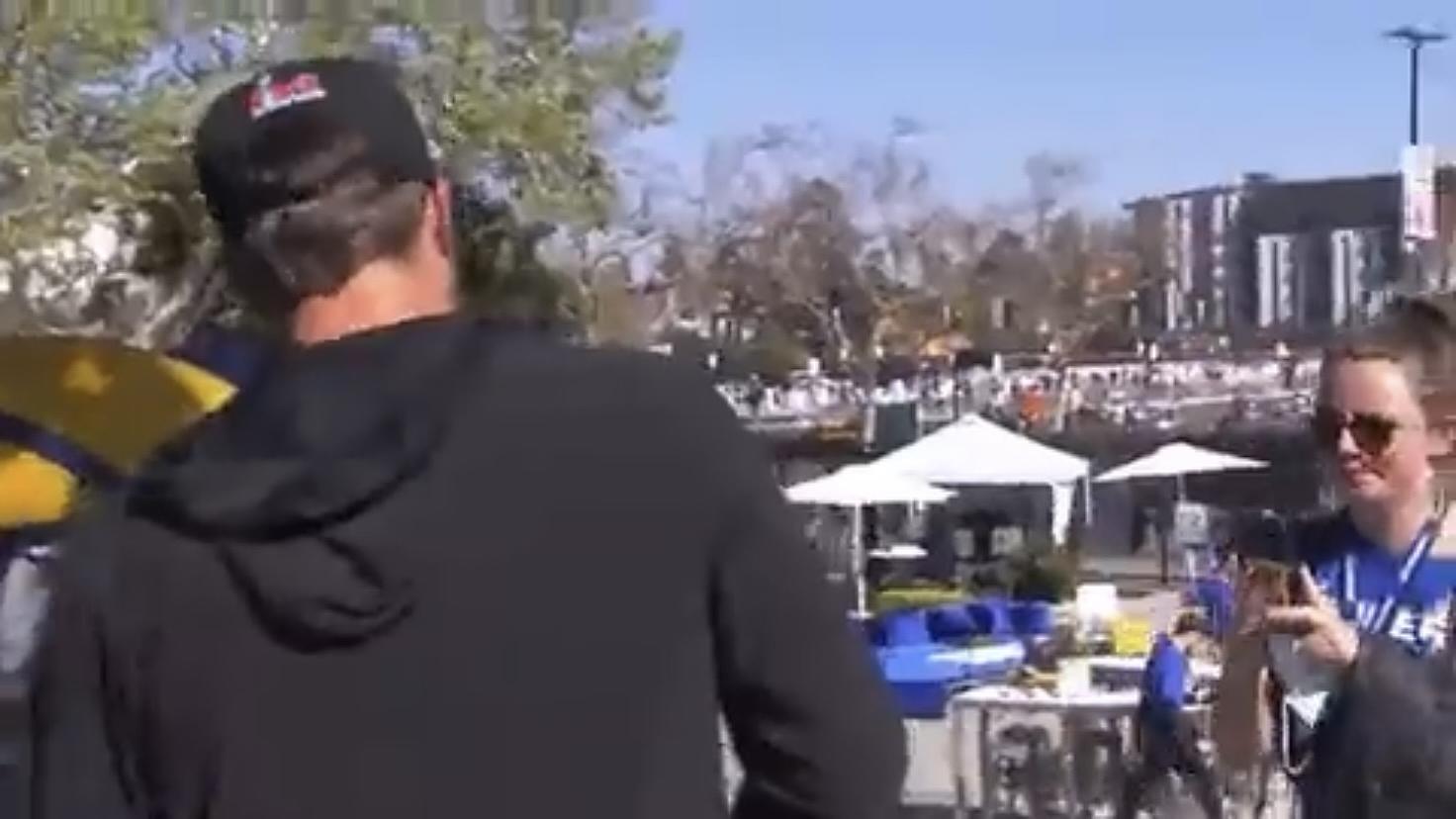 Matthew Stafford turns away as Rams parade photographer falls