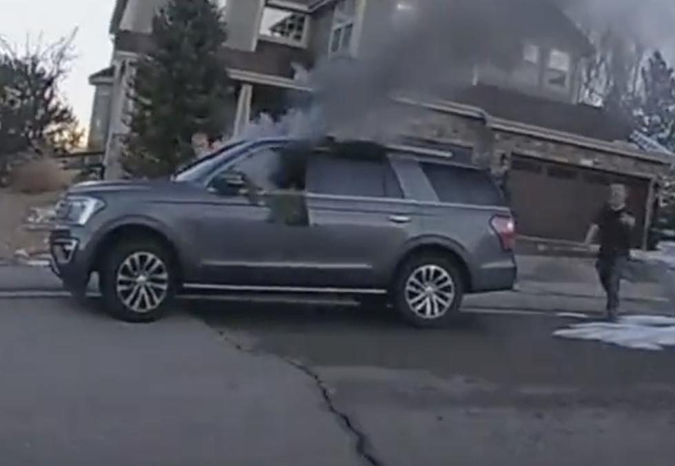 Police Officer Rescues Dog From Burning Vehicle [VIDEO]