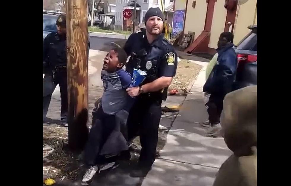 Viral Video of Police Detaining Young Boy for Stealing Bag of Chips Sparks Mixed Reactions