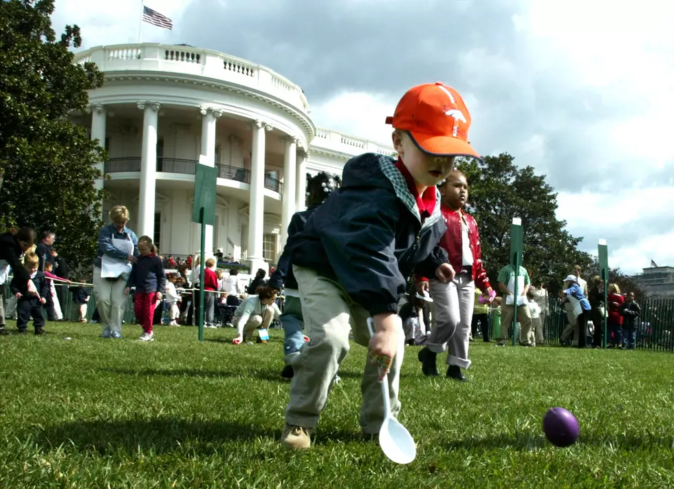 Children roll eggs on White House South Lawn