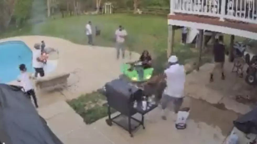 Surveillance Camera Captures Moment Four-Wheeler Stunt Abruptly Ends Backyard BBQ