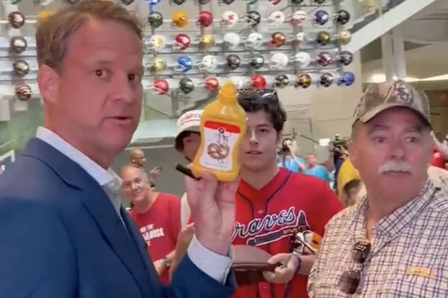 Ole Miss Coach Lane Kiffin Signs Bottle of Mustard for LSU Fan [VIDEO]