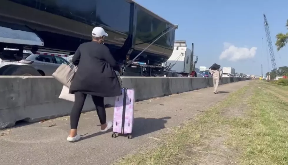 People Stuck in NOLA Traffic Get Out, Walk Along I-10 to Airport