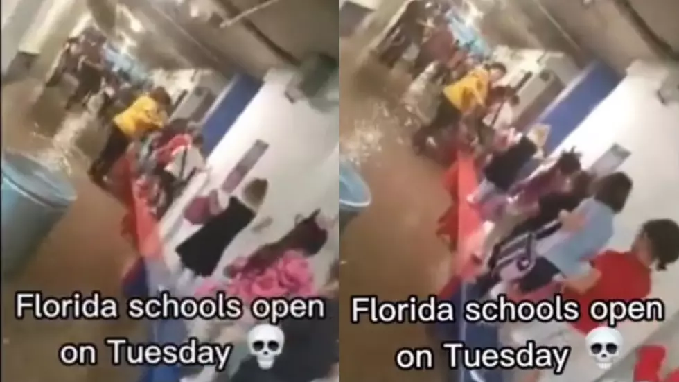 DEBUNKED - Elementary Students Walking Through Flooded Hallway