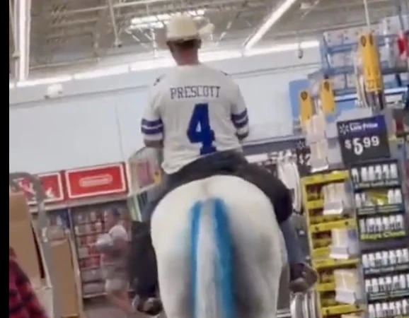 Dallas Cowboys Fan Rides Through Walmart on a Horse After Win