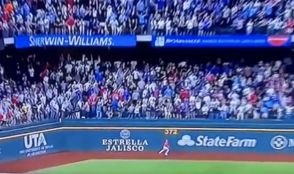 Fan Jumps From Stands in Attempt to Catch Historical Baseball [VIDEO]