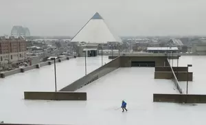 St. Jude Employee Ice Skates on Top of Parking Garage of Campus...