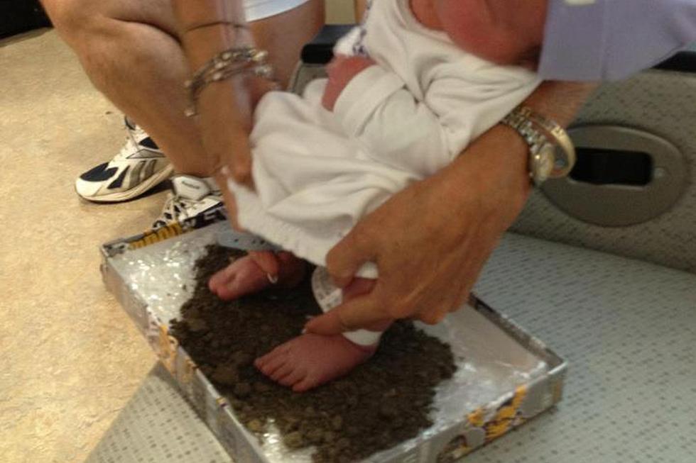 Family Makes Sure Newborn Baby Touches LSU Dirt First