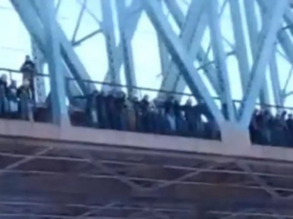 Yikes! Dozens of People Jump Off Bridge Above Icy River Before Being Miraculously Saved [VIDEO]