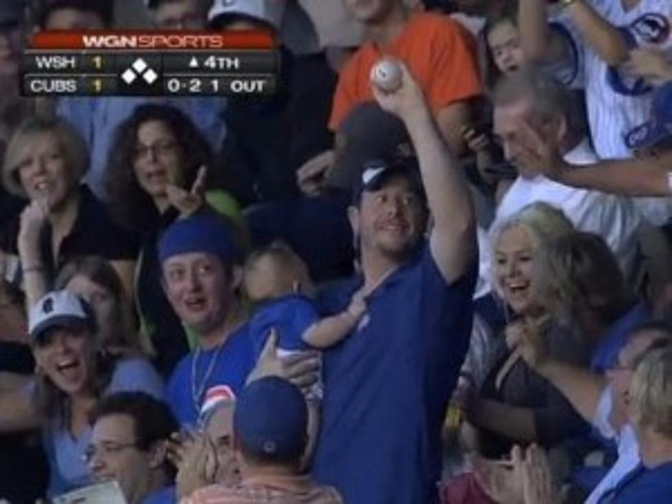 Man Makes Incredible Foul Ball Catch With Baby in His Other Hand [VIDEO]