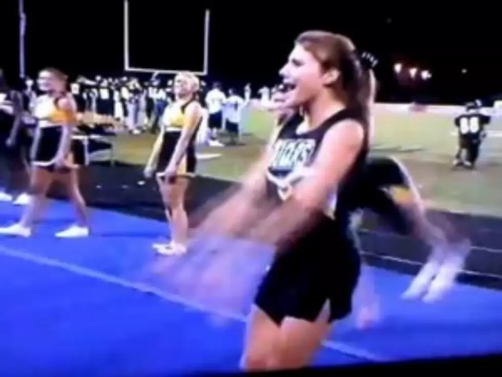 Cheerleader&#8217;s Back Flip Attempt Ends in Failure [VIDEO]