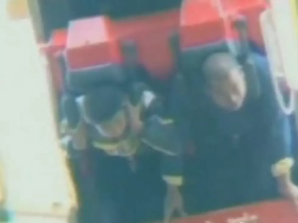 Father and Son Rescued From Stalled, Upside Down Roller Coaster [VIDEO]