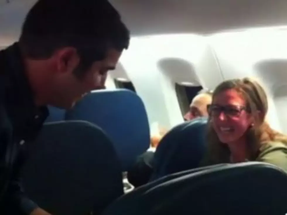 Man Proposes to Girlfriend Mid-Flight in Front of Passengers [VIDEO]