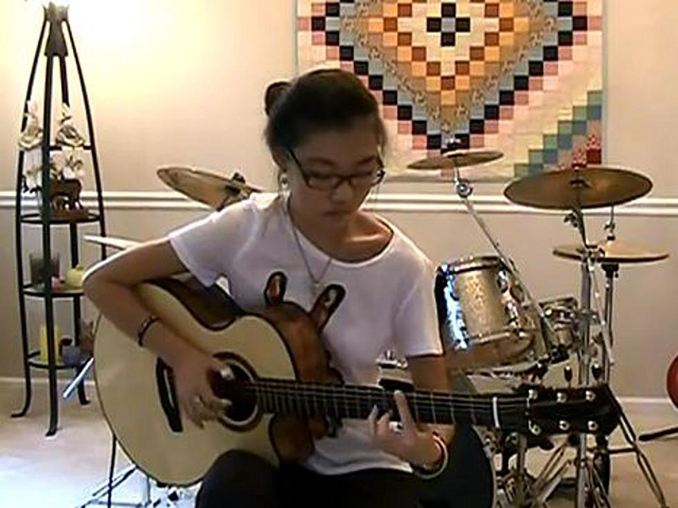 Girl Plays Amazing Acoustic Guitar Version of Queen’s ‘Don’t Stop’ [VIDEO]