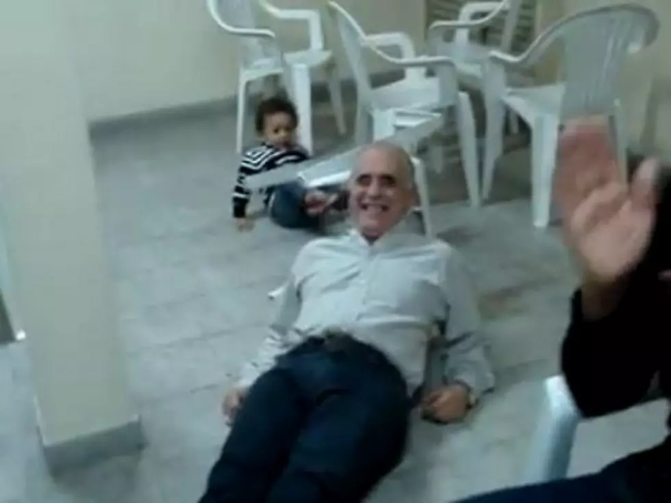 Kid Pulls the Chair Out from Under Grandfather [VIDEO]