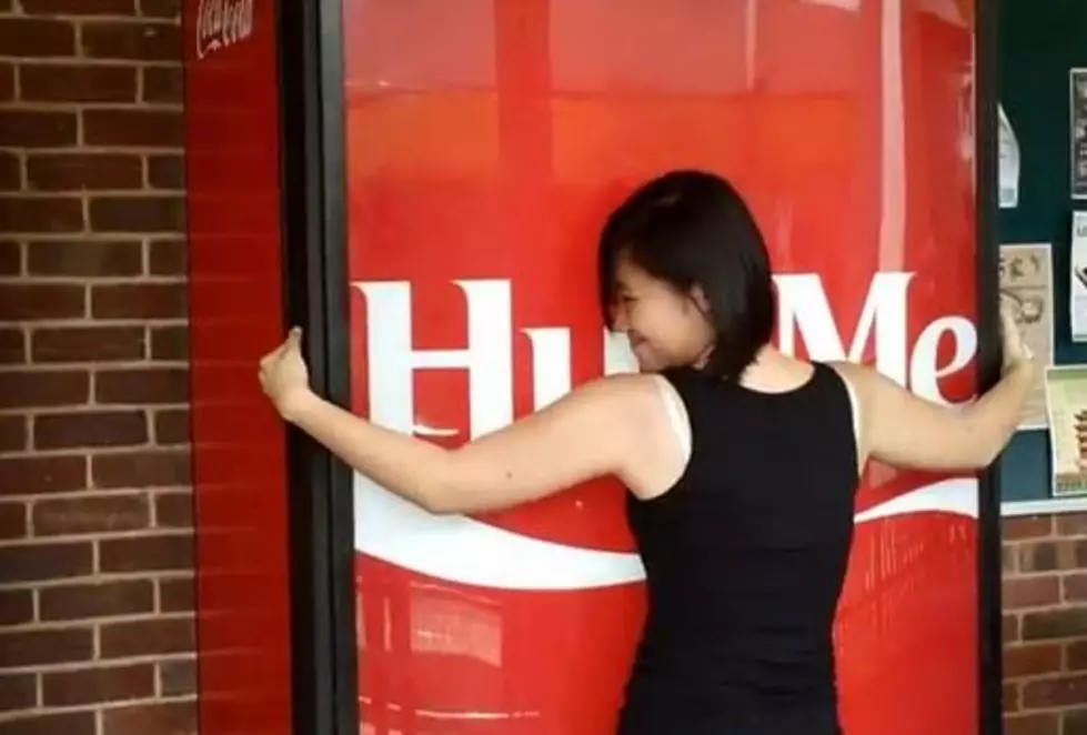Vending Machine Gives Out Cokes For Hugs