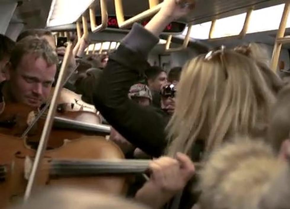 Classical Flash Mob Surprises Subway Riders With Violins, Flutes and Horns