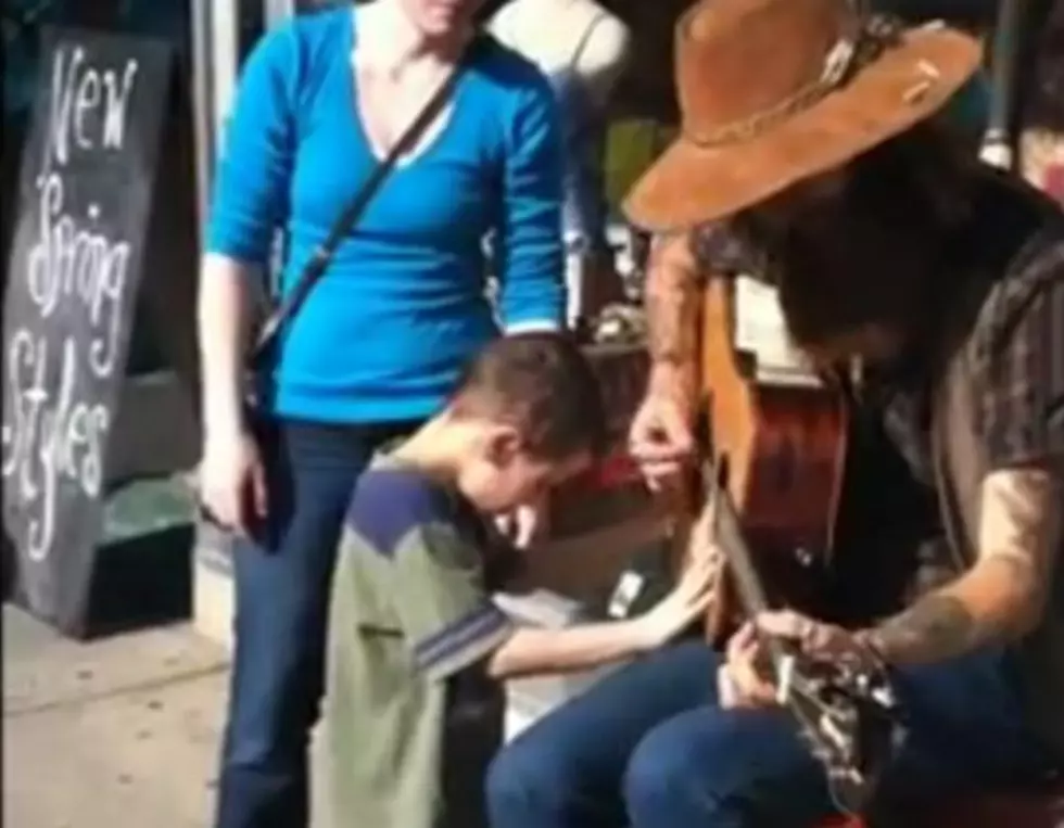 Blind Autistic Boy Has Touching Encounter With Street Musician
