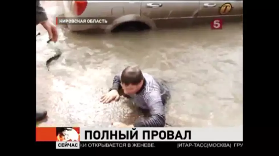 Russian Pothole Doubles As a Swimming Pool
