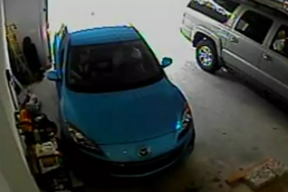17-Year-Old Girl Tries to Back Out of Garage, Fails Miserably