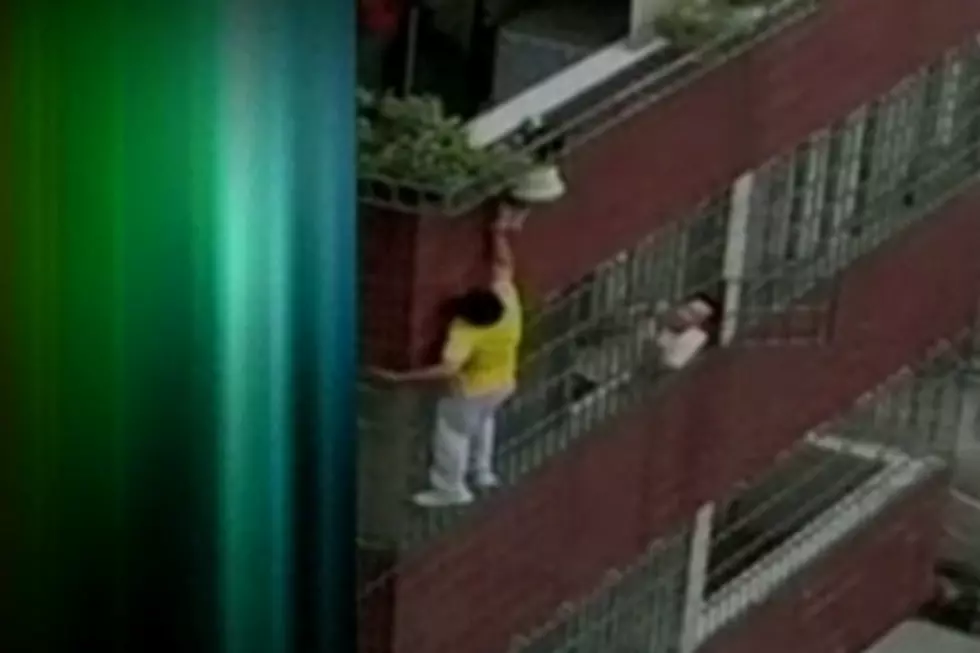 Heroic Man Saves Toddler Dangling from Balcony