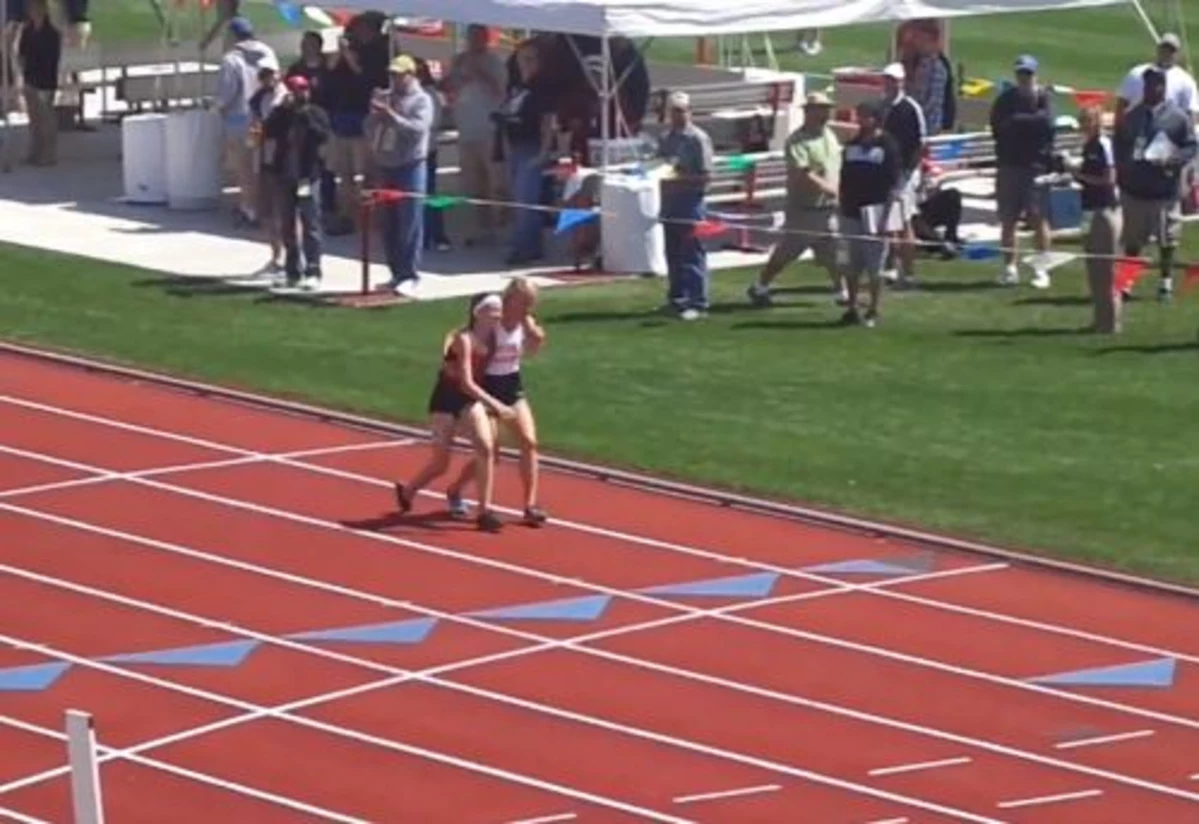 High School Runner Carries Fallen Competitor Across the Finish Line