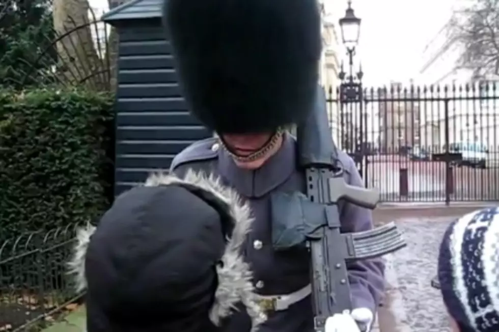 British Guard Breaks Composure, Screams at Little Kid