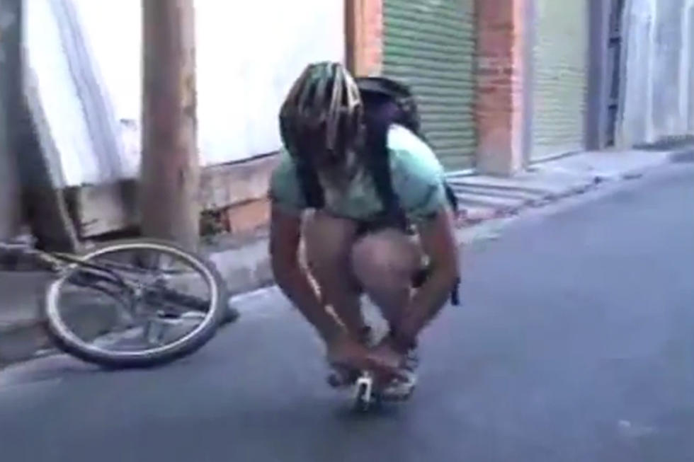 Here’s a Sight — Full-Grown Man Rides an Incredibly Tiny Bicycle