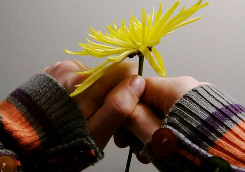 College Student Passes Out Flowers to Strangers to Brighten Their Day