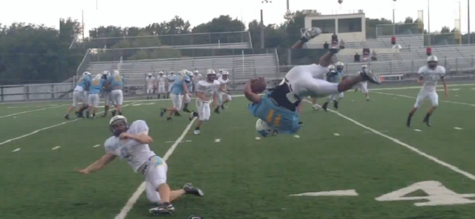 Football Player Flips Over Would-Be Tackle