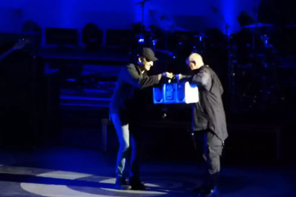 John Cusack Channels Lloyd Dobler, Holds Boombox at Peter Gabriel Concert