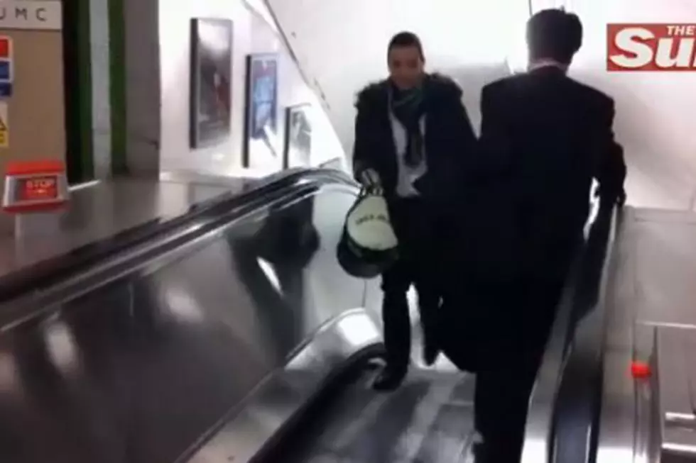 Drunk Man Has Epic Struggle With Escalator